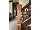 Ornate wood staircase with decorative details at 715 S Anderson St, Elwood, IN 46036