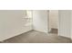 Cozy bedroom with carpet, window, and closet access, perfect for relaxation at 7156 Chemistry Ct, Indianapolis, IN 46239