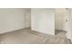 Carpeted bedroom showing doorway and closet space for ample storage at 7156 Chemistry Ct, Indianapolis, IN 46239