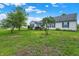 Well-maintained single-story home with a lush lawn and mature trees, offering a peaceful suburban lifestyle at 7156 Chemistry Ct, Indianapolis, IN 46239