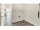 Laundry room with white walls, gray floors, washer/dryer hookups, and a wire shelf at 7156 Chemistry Ct, Indianapolis, IN 46239