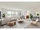 Inviting living room with ample natural light, neutral tones, and cozy seating at 7156 Chemistry Ct, Indianapolis, IN 46239