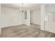 Neutral living room featuring soft gray carpets, white walls and a view to the entry and hallway at 7156 Chemistry Ct, Indianapolis, IN 46239