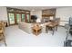 Finished basement features a cozy seating area, stone fireplace, and access to the outside at 7400 Oakbay Dr, Noblesville, IN 46062