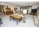 Finished basement boasts a wet bar, stone fireplace, and walk-out access to the backyard at 7400 Oakbay Dr, Noblesville, IN 46062