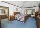 Bedroom with large bed, natural light, and ensuite bathroom at 7400 Oakbay Dr, Noblesville, IN 46062