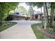 A beautiful driveway leads to the garage and front entrance of this exquisite home at 7400 Oakbay Dr, Noblesville, IN 46062