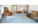 Living room with chair, desk, and bookshelf at 7400 Oakbay Dr, Noblesville, IN 46062