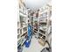 Walk-in pantry with ample shelving for storage at 7400 Oakbay Dr, Noblesville, IN 46062