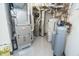This clean utility room features a water heater, HVAC, and water softener system at 7400 Oakbay Dr, Noblesville, IN 46062