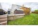 Outdoor view of a home's deck with a hot tub and outdoor seating, enhancing the backyard at 7632 Nestucca Trl, Noblesville, IN 46062
