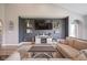 Comfortable living room featuring a neutral color palette, modern decor, and a cozy seating arrangement at 7632 Nestucca Trl, Noblesville, IN 46062
