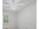Neutral bedroom with a ceiling fan and natural light from a window with blinds at 774 Chapel Pines W Dr, Indianapolis, IN 46234