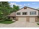 Inviting two-story home with a brick facade and a spacious two-car garage and concrete driveway at 774 Chapel Pines W Dr, Indianapolis, IN 46234