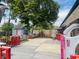 Spacious wooden deck with colorful railings, providing an inviting outdoor living space for gatherings and relaxation at 7844 Partridge Rd, Southport, IN 46227