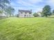A sprawling backyard offers ample space for recreation and enjoyment at 817 Timber Creek Dr, Indianapolis, IN 46239