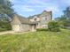 Charming two-story brick home with well-manicured lawn and attached two car garage at 817 Timber Creek Dr, Indianapolis, IN 46239