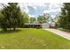 Well-kept brick ranch with attached two-car garage and expansive front yard at 8415 Los Robles Rd, Fishers, IN 46038