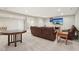 Finished basement area with comfortable seating, a large TV, and ample space for entertainment at 8745 Providence Dr, Fishers, IN 46038