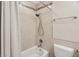 Bright bathroom with tiled shower and tub combination with neutral color at 8745 Providence Dr, Fishers, IN 46038