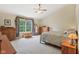 Bedroom featuring natural light, a ceiling fan, plush carpet and tasteful decor at 8745 Providence Dr, Fishers, IN 46038