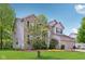 Lovely single Gathering home with a brick facade, large windows and well maintained lawn and landscaping at 8745 Providence Dr, Fishers, IN 46038