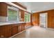 Kitchen with wood cabinetry and window at 9170 W Old Nashville Rd, Columbus, IN 47201
