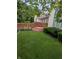 A spacious yard enclosed by a wooden fence offers plenty of room for activities at 9640 Bramblewood Way, Carmel, IN 46032
