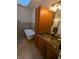 Bathroom featuring a modern vanity with granite countertop, a vessel sink and soaking tub at 9640 Bramblewood Way, Carmel, IN 46032