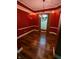 Dining room with hardwood floors and elegant lighting creates a welcoming atmosphere at 9640 Bramblewood Way, Carmel, IN 46032