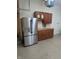 Well-organized garage with storage cabinets and a refrigerator at 9640 Bramblewood Way, Carmel, IN 46032