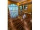 Spacious living room boasts wood floors and an open concept design, perfect for gatherings at 9640 Bramblewood Way, Carmel, IN 46032