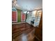 Office featuring hardwood floors, built in shelves, and natural light at 9640 Bramblewood Way, Carmel, IN 46032