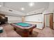 Basement features a poker table ready for entertainment, offering space for fun and relaxation at 9915 Wellsford Cir, Indianapolis, IN 46236