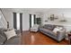 Bright and airy living room with hardwood floors, neutral paint, and stylish furniture at 9915 Wellsford Cir, Indianapolis, IN 46236