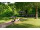 Enjoy a serene gazebo, park bench, and walking path in the lush, green community park at 1018 Cyprian Way, Lebanon, IN 46052
