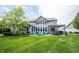Expansive backyard featuring a patio with outdoor seating, pergola, and hot tub, perfect for entertaining at 10291 Normandy Way, Fishers, IN 46040