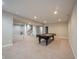 Finished basement showcasing versatile layout, neutral carpet, and potential for a variety of uses at 10291 Normandy Way, Fishers, IN 46040
