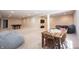 Open finished basement featuring comfortable seating, dining area and recreation space on neutral carpeting at 10291 Normandy Way, Fishers, IN 46040