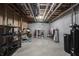 Unfinished basement showcasing exposed utilities and ample storage space ready for customization at 10291 Normandy Way, Fishers, IN 46040
