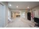 Finished basement area with staircase, neutral carpet, and open layout ready for entertainment and relaxation at 10291 Normandy Way, Fishers, IN 46040