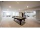 Spacious finished basement with neutral walls and carpet and abundant recessed lighting, perfect for recreation at 10291 Normandy Way, Fishers, IN 46040