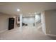 Finished basement with neutral carpet, painted columns, and open space for versatile use at 10291 Normandy Way, Fishers, IN 46040