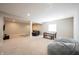 Large finished basement with neutral walls and carpet, providing an open and versatile space at 10291 Normandy Way, Fishers, IN 46040