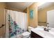 Bathroom featuring neutral paint, a shower/tub combo, and modern fixtures at 10291 Normandy Way, Fishers, IN 46040