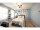 Cozy bedroom featuring plush carpet, modern ceiling fan, and ample natural light at 10291 Normandy Way, Fishers, IN 46040