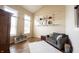 Cozy living room with comfortable seating, decorative shelves, and natural light at 10291 Normandy Way, Fishers, IN 46040