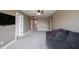 Inviting living room with a comfortable couch, neutral walls and carpet creating a cozy atmosphere at 10291 Normandy Way, Fishers, IN 46040