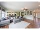 Spacious living room with a large sectional sofa and open floor plan at 10291 Normandy Way, Fishers, IN 46040