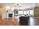 Cozy living room featuring a fireplace and ample natural light from large windows at 10291 Normandy Way, Fishers, IN 46040